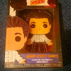 Jerry puffy shirt pin